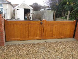 Straight Top Flood Divert Kitemarked gates made in Accoya and treated with Sikkens 'Light Oak' stain